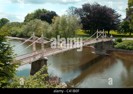 The Victoria footbridge across the River Wye in Hereford. )pened in 1898 to commemorate the Diamond Jubilee of Queen Victoria. Stock Photo