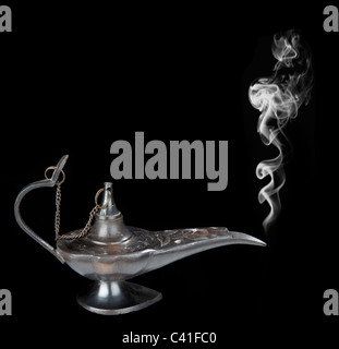 Genie lamp with a smoke Stock Photo