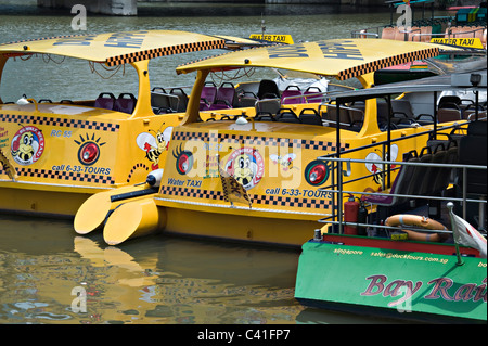 Yellow and Green Water Taxi Boats Moored on The Singapore River near Clarke Quay Republic of Singapore Asia Stock Photo