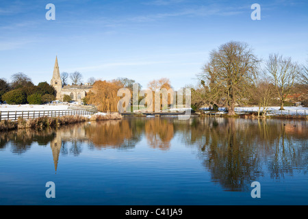 All Saint's church and Brompton ponds at Brompton by Sawdon, North Yorkshire. Stock Photo