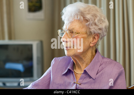 Portrait of 91 years old woman in her flat Stock Photo