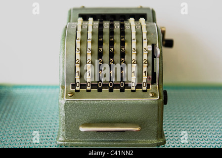 Antique adding machine Stock Photo