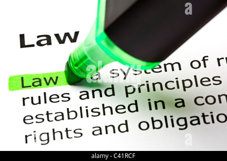 The word 'Law' highlighted in green with felt tip pen Stock Photo
