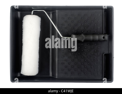 Black plastic paint tray and emulsion paint roller Stock Photo