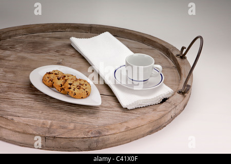 Chocolate chip cookies served on an antique wooden tray Stock Photo