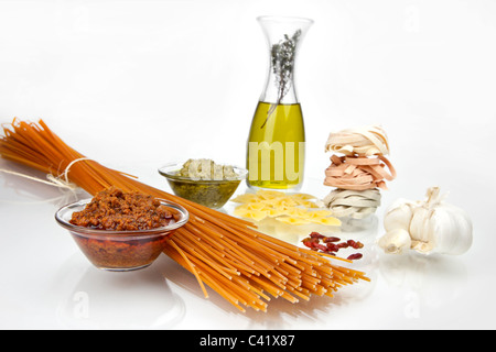 different kinds of pasta with pesto two different varieties Stock Photo