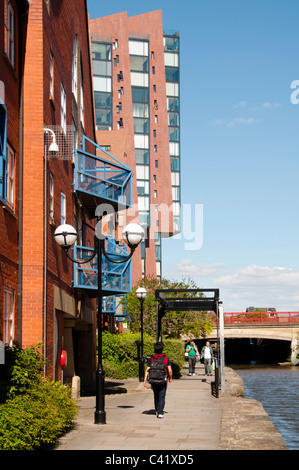 Islington Wharf apartment block, New Islington, Manchester, England, UK. From the Ashton canal towpath at Piccadilly Village. Stock Photo