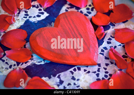 red heart in the middle of blue hearts with I love you Stock Photo - Alamy