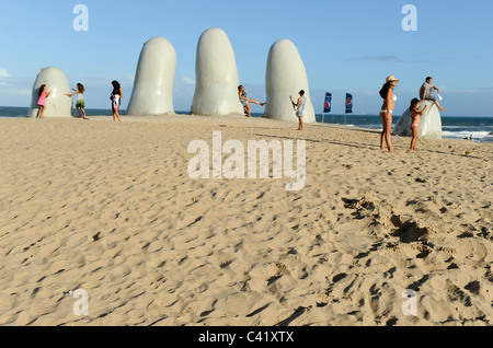 URUGUAY, Punta del Este, sculpture „Los Dedos“ the fingers of a hand at the beach Stock Photo