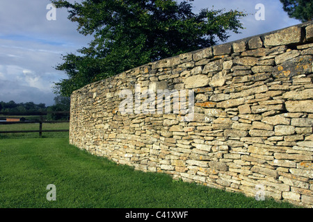 Drywall built with Mendip Somerset stones Somerset England UK. Stock Photo