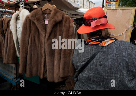 Vintage fur coats and jackets for sale on a Portobello Road market stall Notting Hill London England UK   KATHY DEWITT Stock Photo