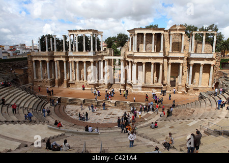 Tourists visit the Roman Theatre (Teatro Romano) at Merida in the Extremadura region of Spain. Stock Photo
