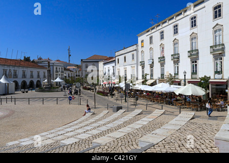 Praca da Republica, main public square in Tavira, Algarve, Portugal. The square is lined with shops and cafes. Stock Photo