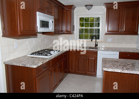 Wooden Counter Top With Kitchen Cabinet Background Stock Photo