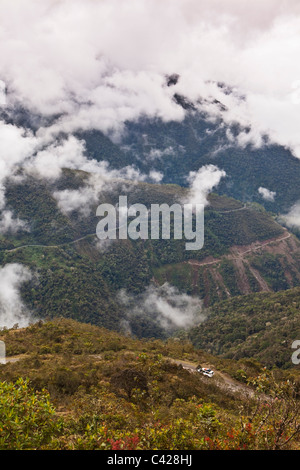 Peru, Las Cruses, road in cloud forest. Tourists in car to Manu National Park. UNESCO World Heritage Site. Stock Photo