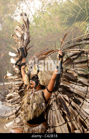 Feathered owl dancer performing at the Sacred Mayan Journey 2011 event, Riviera Maya,  Xcaret Park, Quintana Roo, Mexico Stock Photo