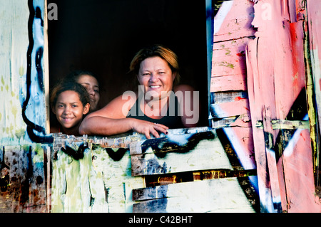 Palafitas or Stilt dwellers living and fishing on the river that flows through Recife in Northeastern Brazil. Stock Photo