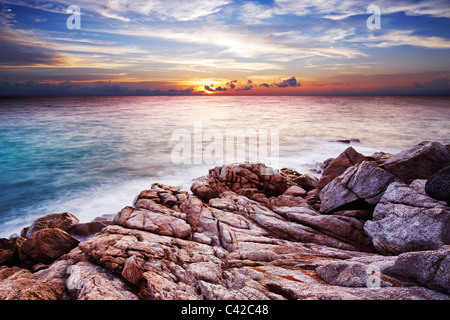 Sunset over the tropical bay. Long exposure shot. Stock Photo