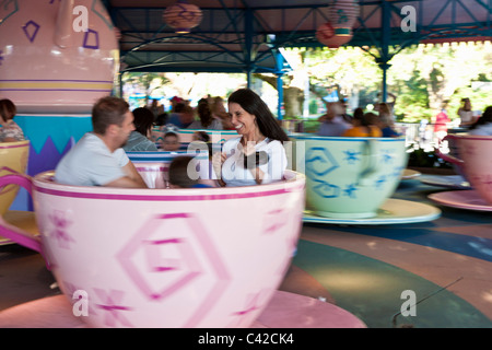 Fast blurred motion of the Mad Tea Party attraction ride in Fantasyland at the Magic Kingdom in Disney World, Kissimmee, Florida Stock Photo