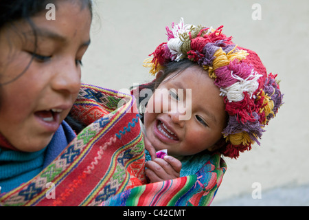 Peru, Patakancha, Patacancha, village near Ollantaytambo. Indian Baby and girl in traditional dress. Stock Photo