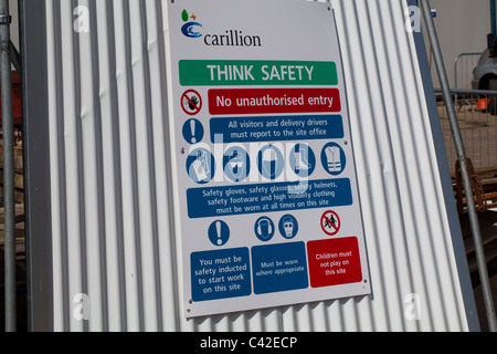 Sign. Health and Safety, on a perimeter fence to a Building Site. Stock Photo