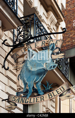 PARIS, FRANCE - MAY 08, 2011:  Metal sign for the Auberge Sanglier Bleu ( Blue Boar inn ) in Boulevard de Clichy, Pigalle Stock Photo