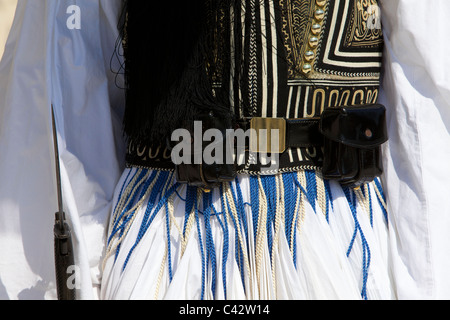 Red tsarouhi leather clogs with a black pompon of the Evzones at the Tomb of the Unknown Soldier  in Athens, Greece Stock Photo