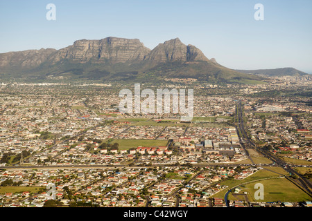 Aerial view looking down Klipfonetin Road (the M18) over the suburbs of Athlone and Rylands in Cape Town, South Africa. Stock Photo