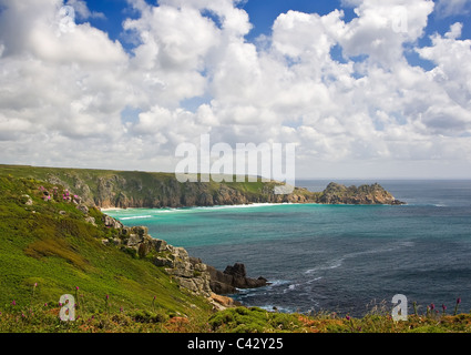 Treen Cliffs near Porthcurno to Logan Rock, West Cornwall, England UK Stock Photo