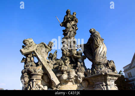 Statues along Charles Bridge in Prague Stock Photo