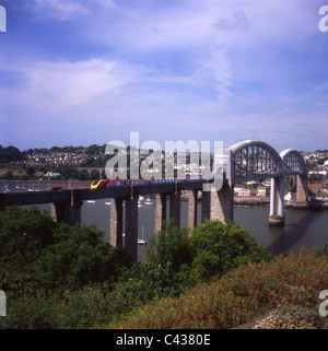 Virgin Voyager crosses the River Tamar on Brunel's famous Royal Albert Bridge which spans the border between Devon and Cornwall.