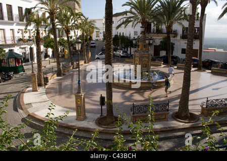 The attractive frog and fish Fountain in Plaza de Espana, in the pretty white fortified town of Vejer de la Frontera, Spain Stock Photo