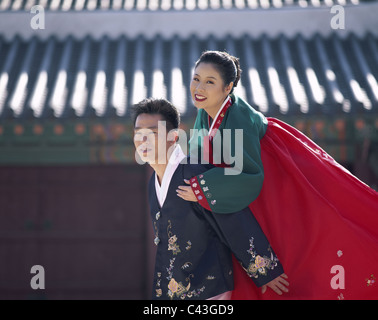 Asia, Costumes, Couple, Holiday, Kyongbokkung palace, Landmark, Seoul, South Korea, Korea, Tourism, Traditional, Travel, Vacatio Stock Photo