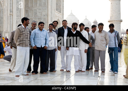 Indian Muslim take group photography in Taj Mahal, Agra, India Stock Photo