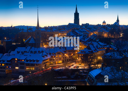 Bern, Switzerland, canton Bern, town, city, capital, Old Town, dusk, churches, houses, homes, snow, winter, lights, illumination Stock Photo