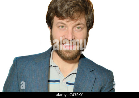 Smiling bearded man in a blazer Stock Photo