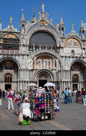 Venice St Mark's Square with souvenir stall in foreground Italy Europe Stock Photo