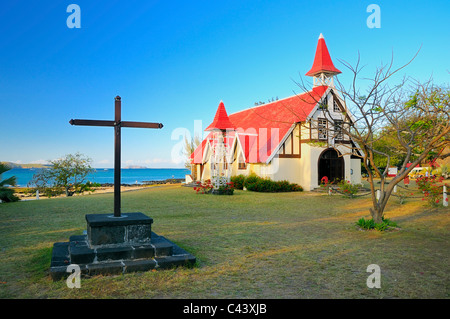 The landmark of Cap Malheureux is the famous church with a red roof. Cap Malheureux, Riviere du Rempart, Mauritius. Stock Photo