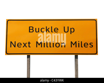 Buckle Up Next Million Miles highway sign. Stock Photo