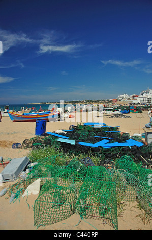 Cray pots on beach, Armação de Pêra, Algarve Region, Portugal Stock Photo