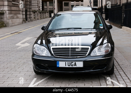 A Ugandan diplomatic car with personalised vanity number plates parked in cental London. Stock Photo