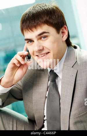 Portrait of handsome man calling by mobile phone Stock Photo