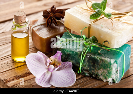 Pieces of natural soap with oil and herbs. Stock Photo