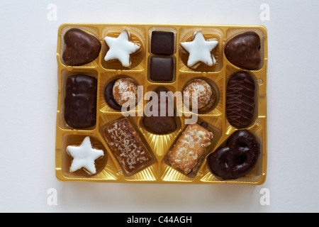 Box of Marks & Spencer Lebkuchen selection biscuits opened to show contents isolated on white background Stock Photo