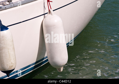 White Plastic Fender On The Side Of A Yacht Stock Photo