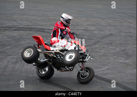 Stunt quad biker performing at Santa Pod Stock Photo