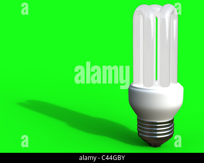 Energy saver light bulb on green background Stock Photo