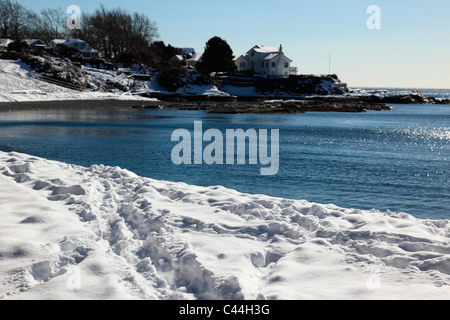 snow covered beach with tracks in snow Stock Photo