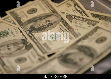 Fake American dollar bank notes, and diagrams of them, on display by Yoshihide Matsumura, Matsumura Technology Co., Japan. Stock Photo