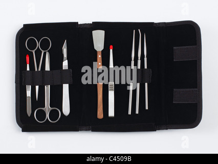 Various surgical instruments in black case Stock Photo